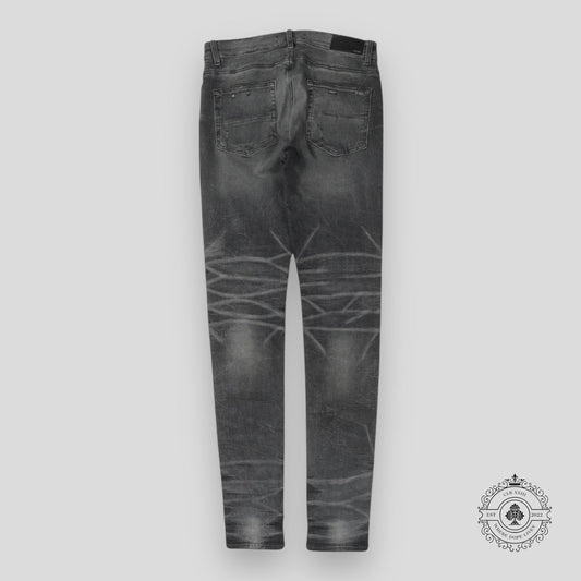 Amiri Faded Denim Jeans in Grey