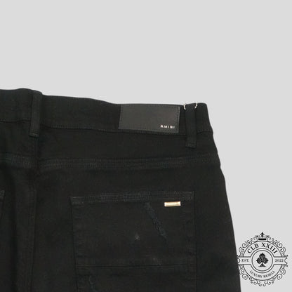 Amiri Banana Leaf Patch Thrasher Jeans in Black