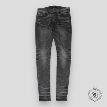 Amiri Faded Denim Jeans in Grey