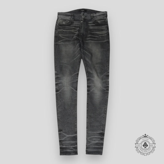 Amiri Faded Denim Jeans in Grey