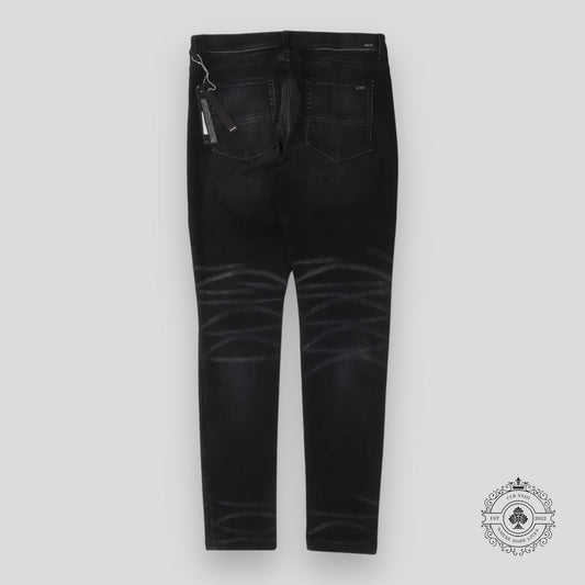 Amiri Leopard Patch Thrasher Jeans in Black