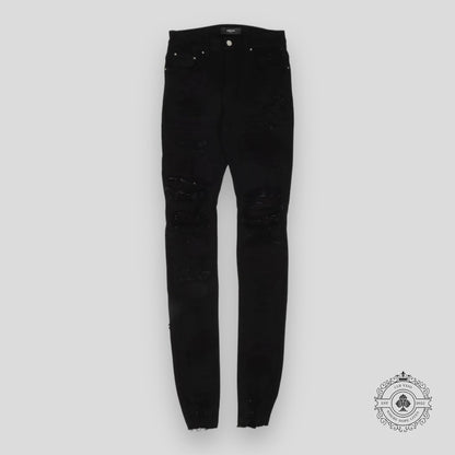 Amiri Distressed Denim Jeans in Black